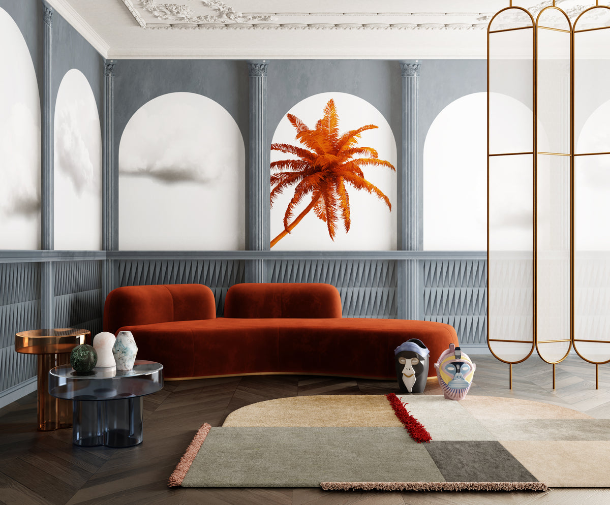 Tateyama XL Sofa in rust velvet in a grey arched room with an orange palm mural