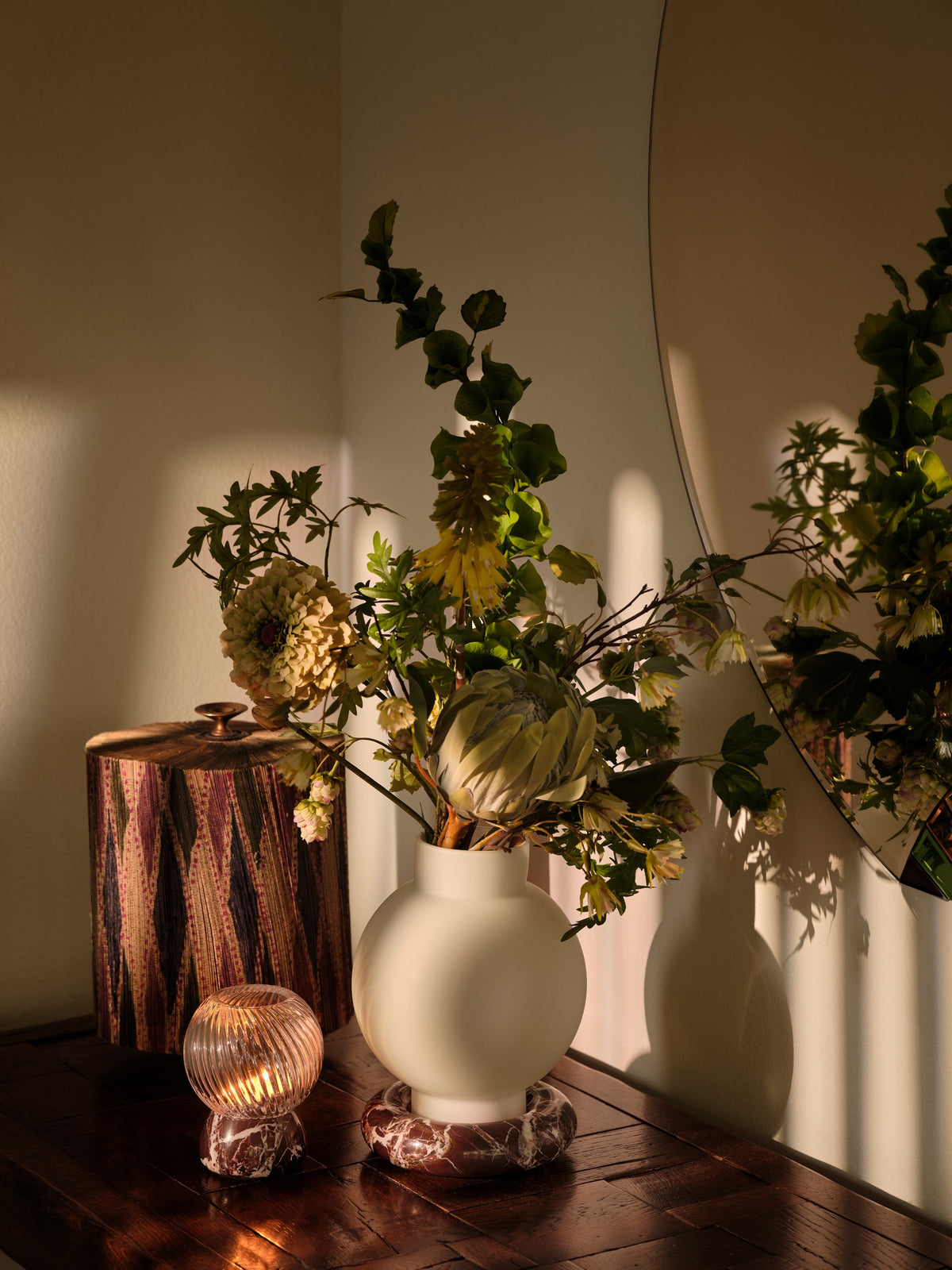 Flora Vase styled with flowers in an interior by Maison Burgos