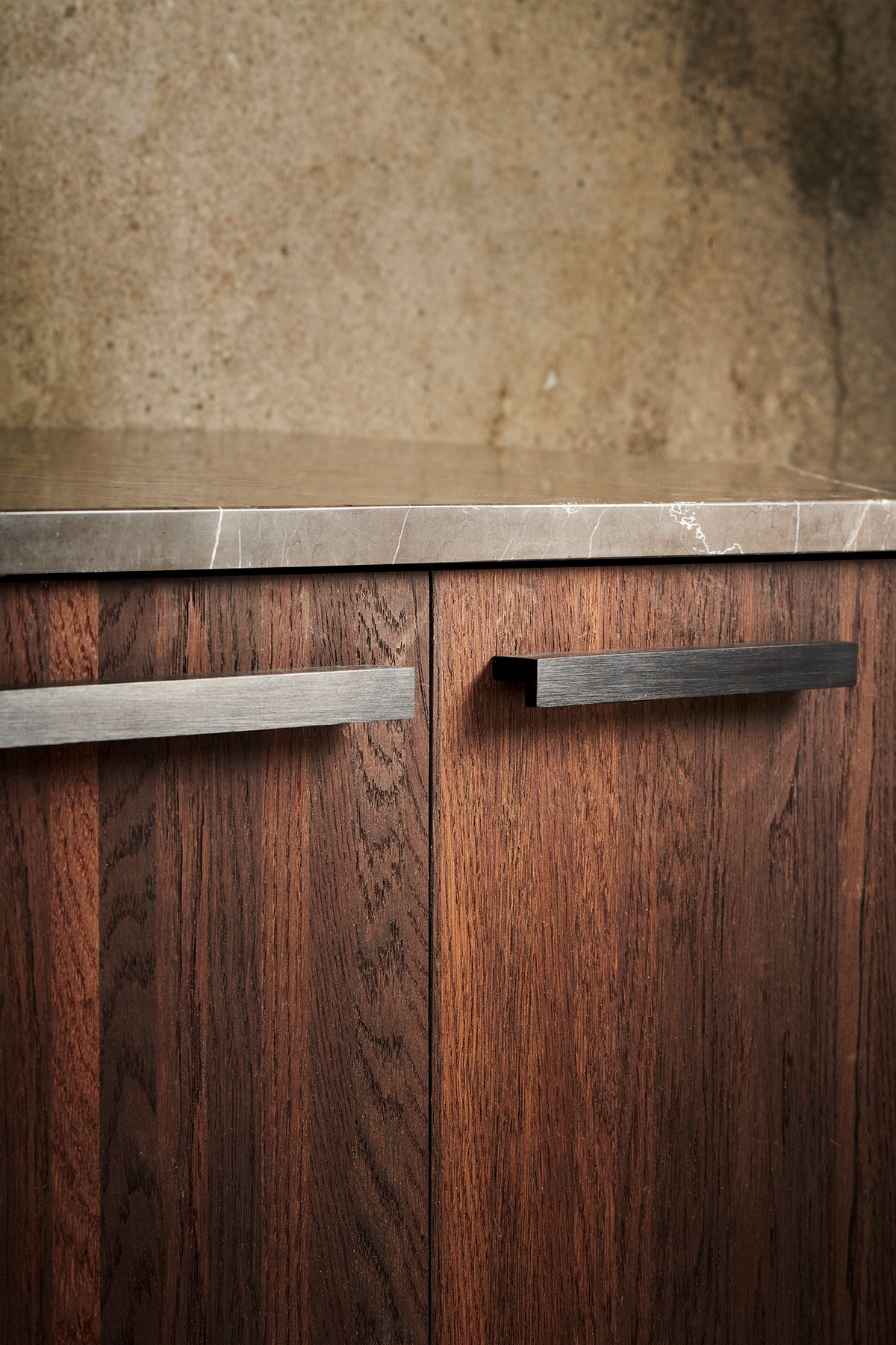 Get a Grip 2 cabinet handles in black on a walnut cabinet by Maison Burgos