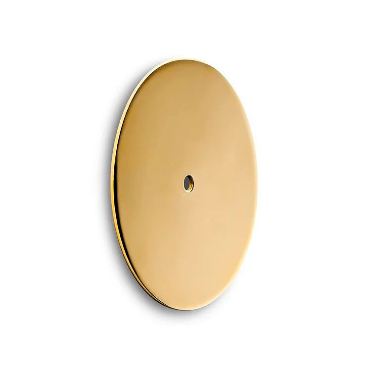 Get a Grip - Backplate Brass, polished round brass backplate, angled view