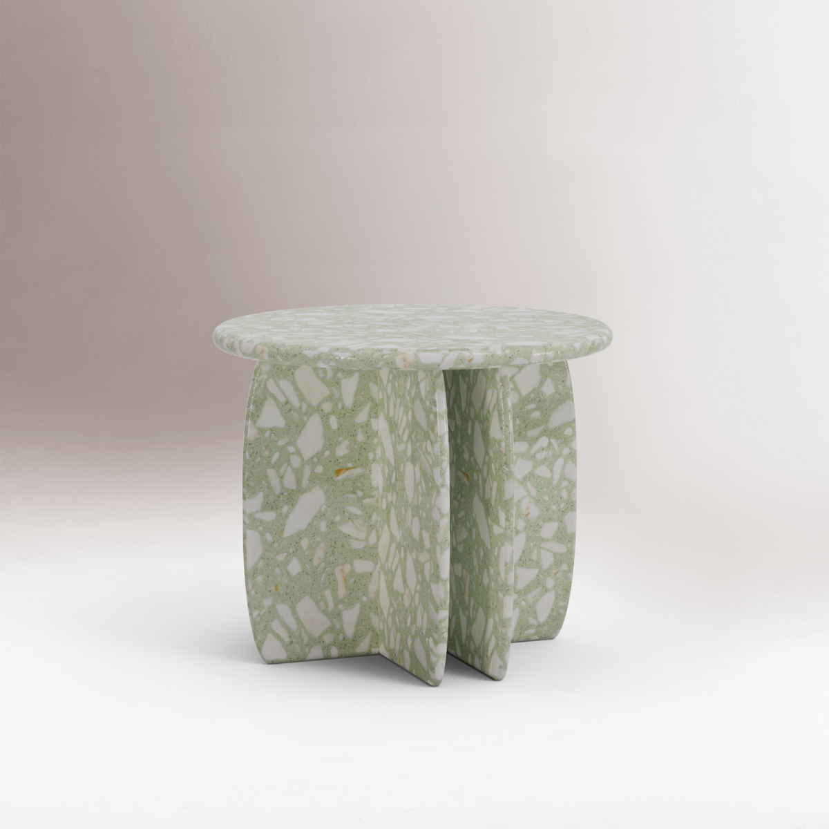 Catus Marble Side Table in light green Terrazzo in a soft-lit studio