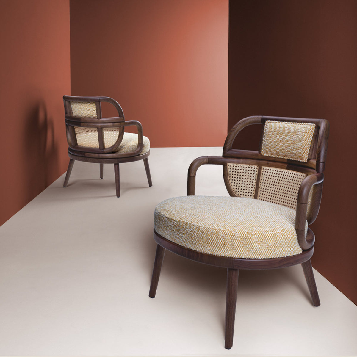 Havana Armchair pair in cream in a terracotta-walled room