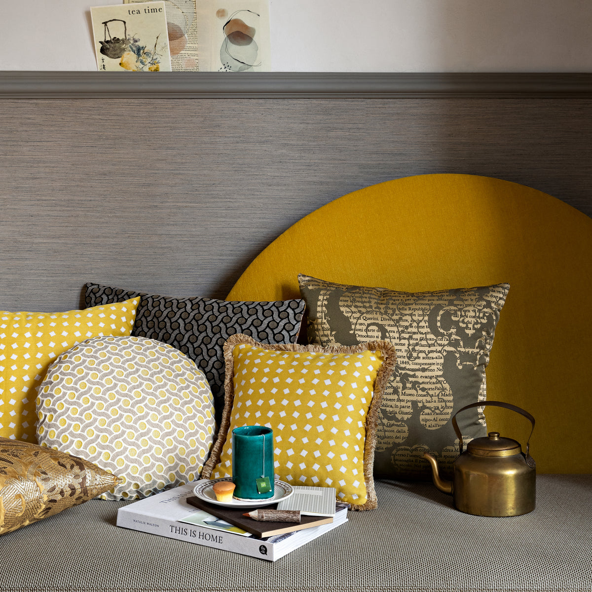 Horizon Sofa, close-up of mustard backrest with yellow and patterned pillows