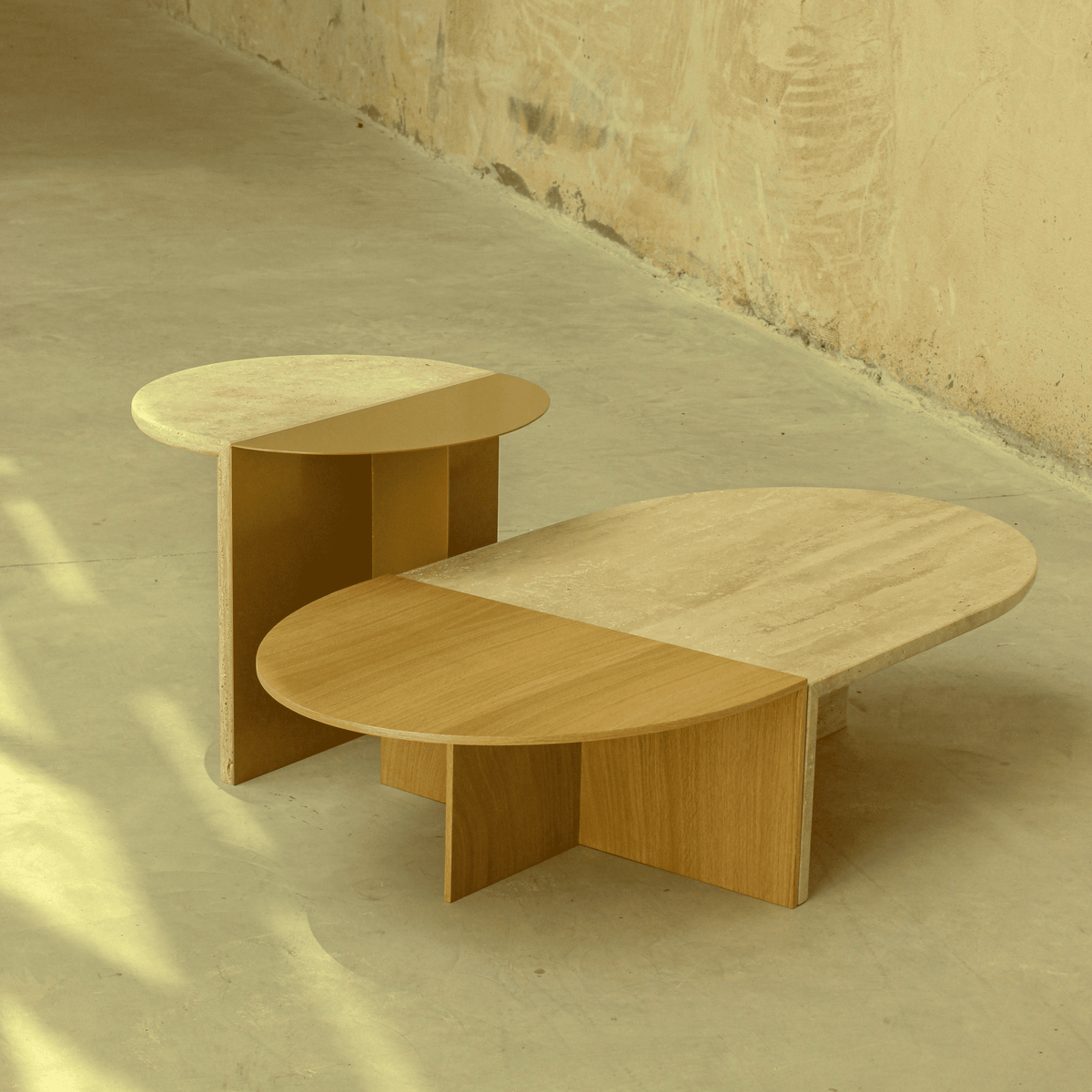 Duplex Coffee Table in natural wood finishes in a sunlit room with plaster walls
