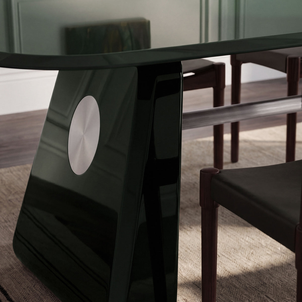 Inge Dining Table in green lacquer, close-up of the leg disc and stretcher