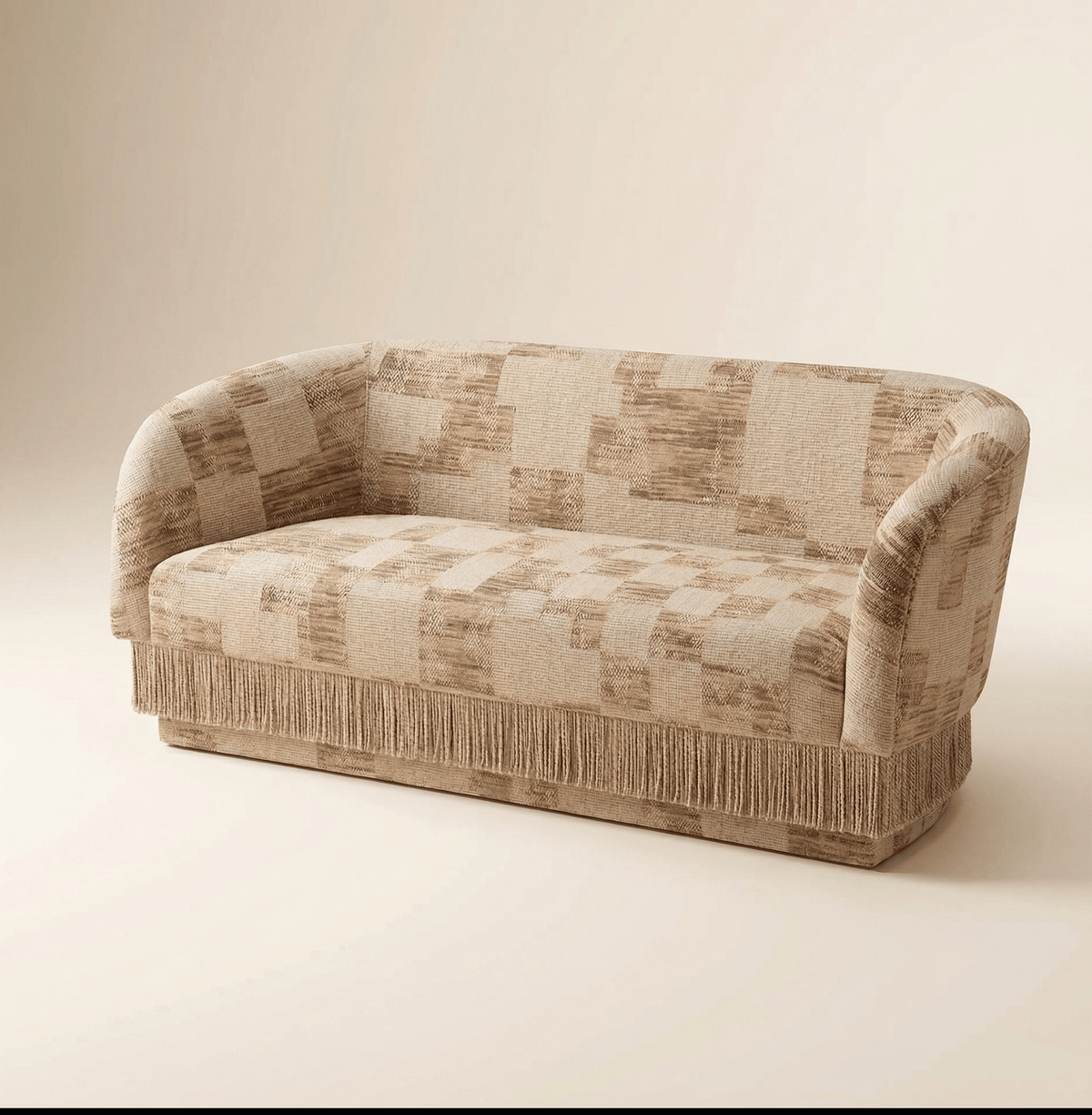 La Folie Sofa in beige patchwork jacquard with fringe, three-quarter view