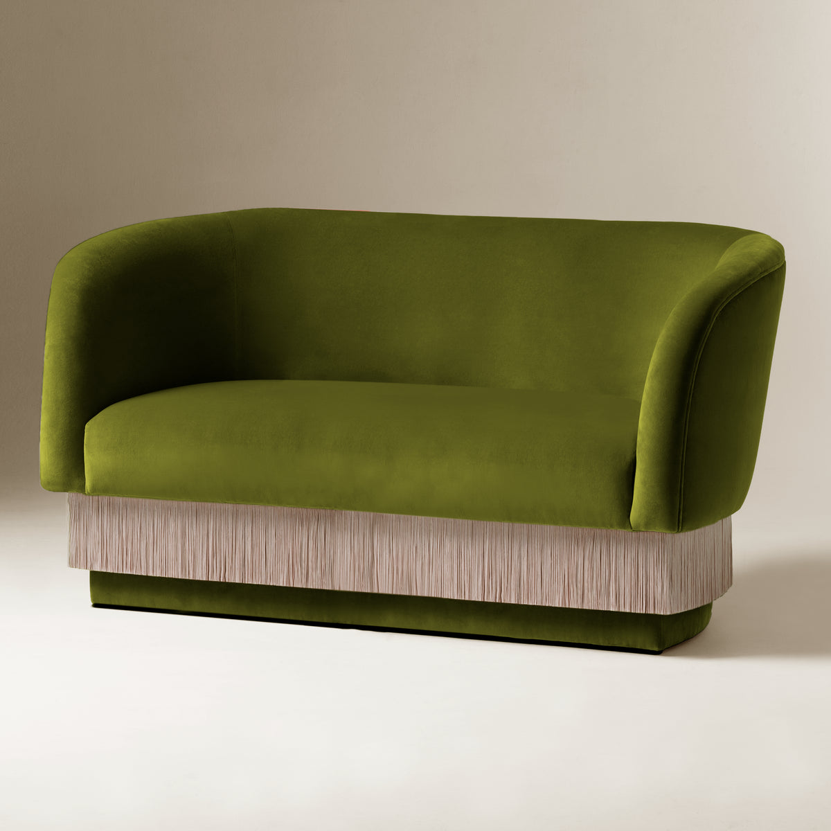 La Folie Sofa in Kiwi green velvet with cream fringe trim