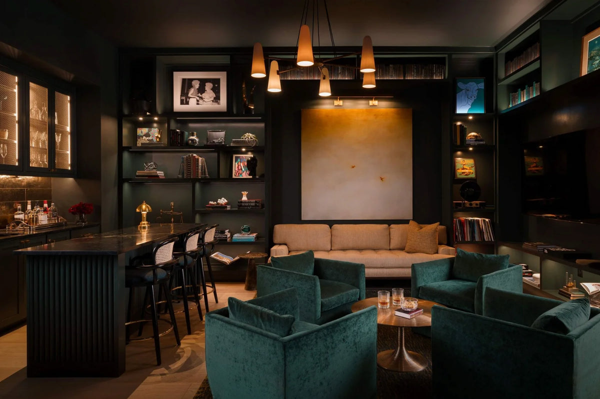 Luc bar chairs at a dark green lounge bar