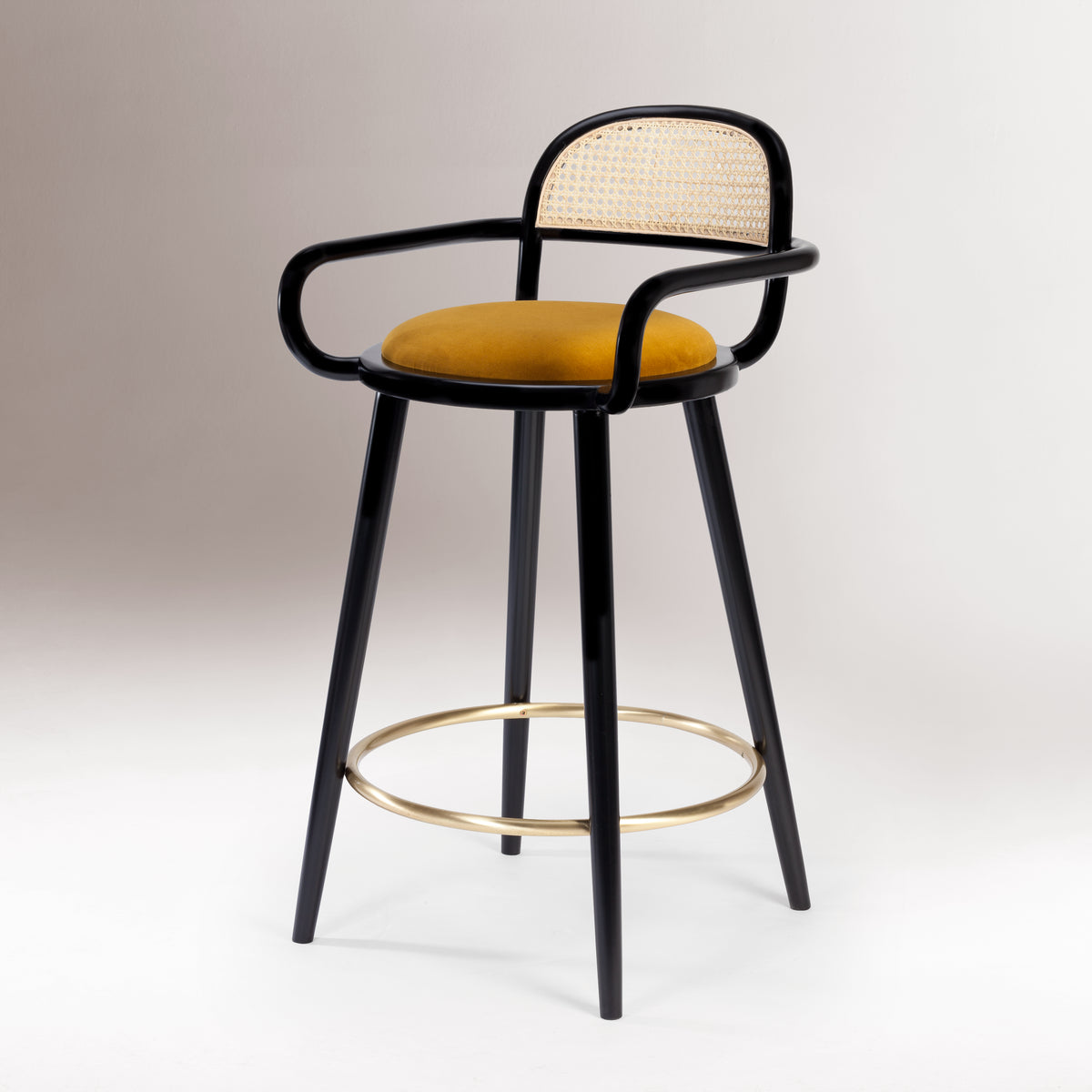 Luc bar chair, black frame, rattan back and mustard seat, studio view