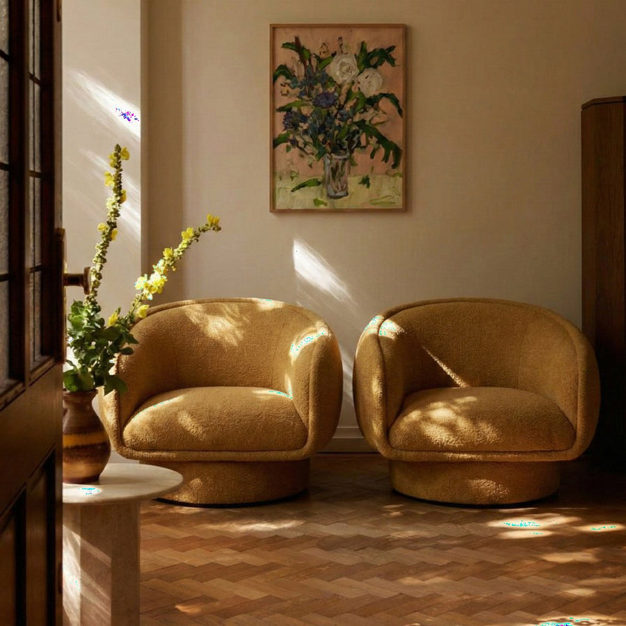 Moon swivel armchairs in a sunlit room by Maison Burgos
