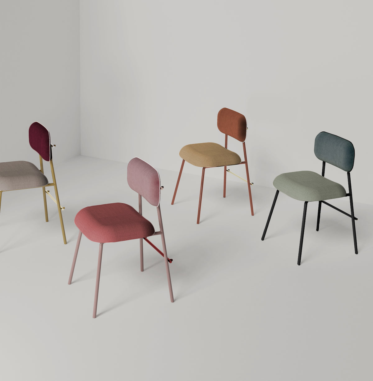 Miami Dining Chairs in assorted velvet colours and frame finishes grouped on grey