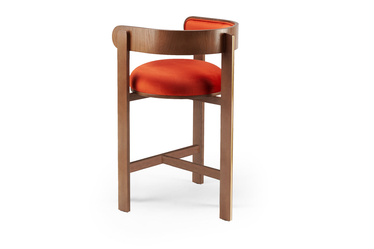Moulin Bar Stool in orange velvet with walnut-tone frame, three-quarter back view