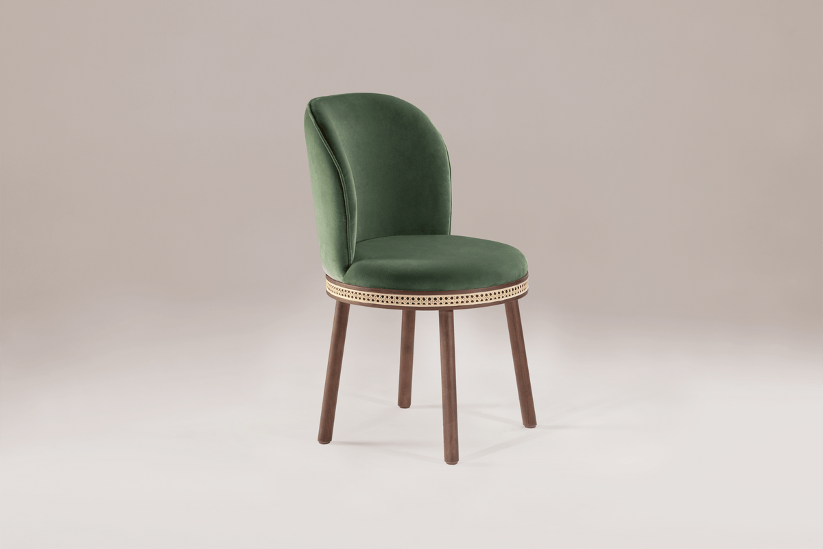 Alma Dining Chair in green velvet with walnut legs, three-quarter view