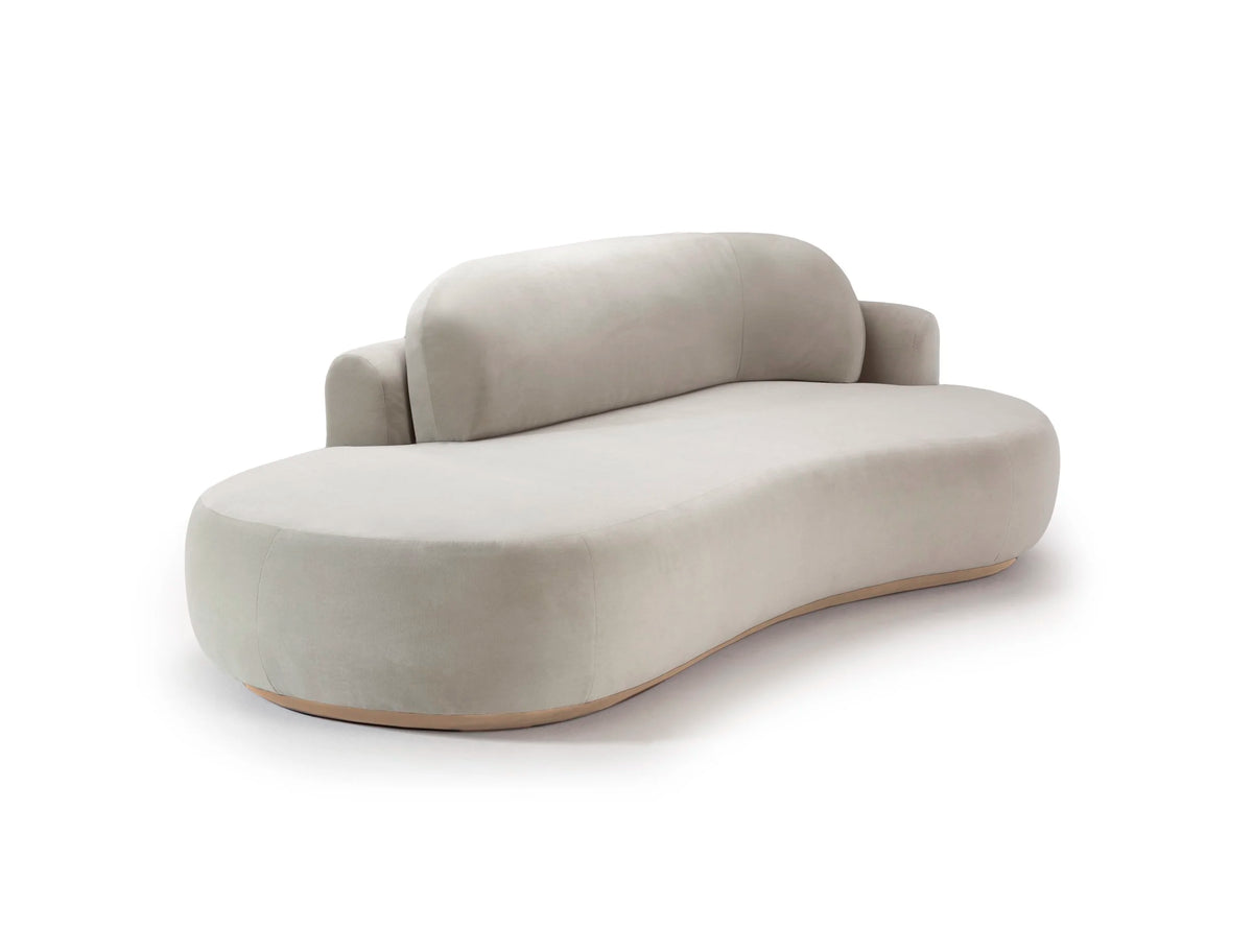 Naked Curved Sofa Single in light grey upholstery on a slim wood base
