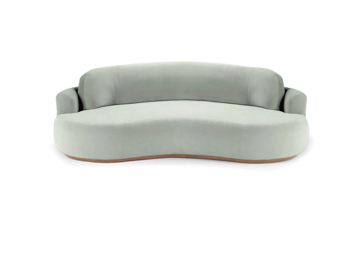 Naked Round Sofa in pale sage velvet, front view on a white background