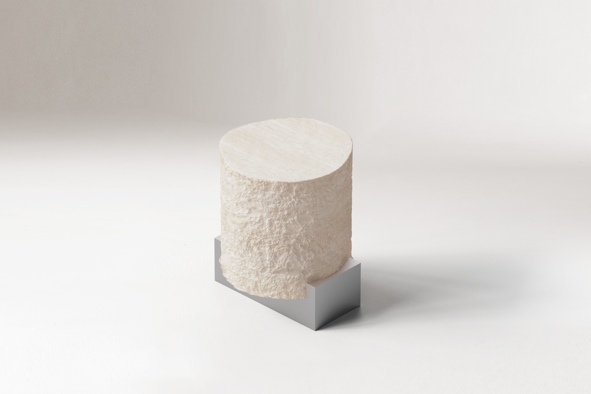 On The Rocks Side Table travertine top angled view by Maison Burgos