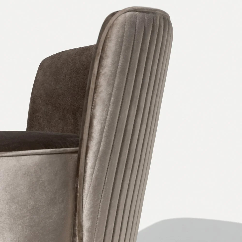 Opera Armchair detail of the pleated velvet backrest from the side