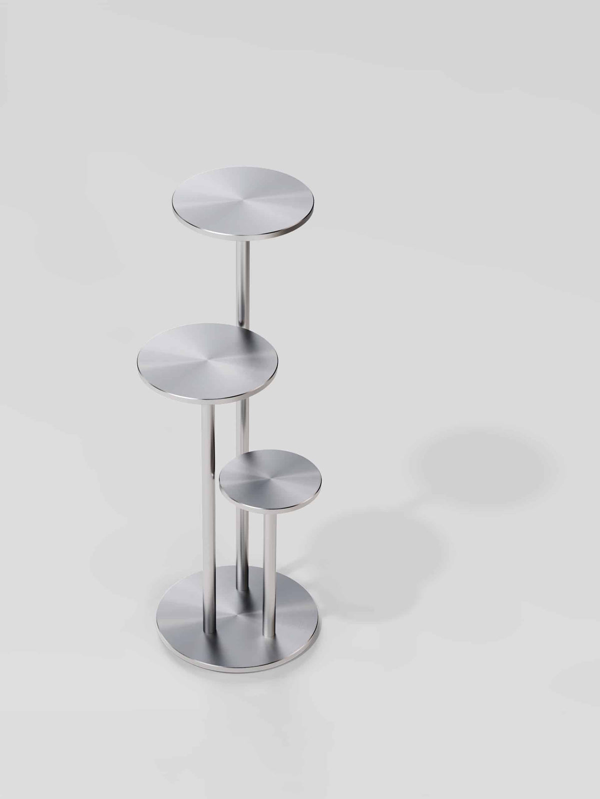 Orion Side Table in Satin Aluminium, three-quarter view from above