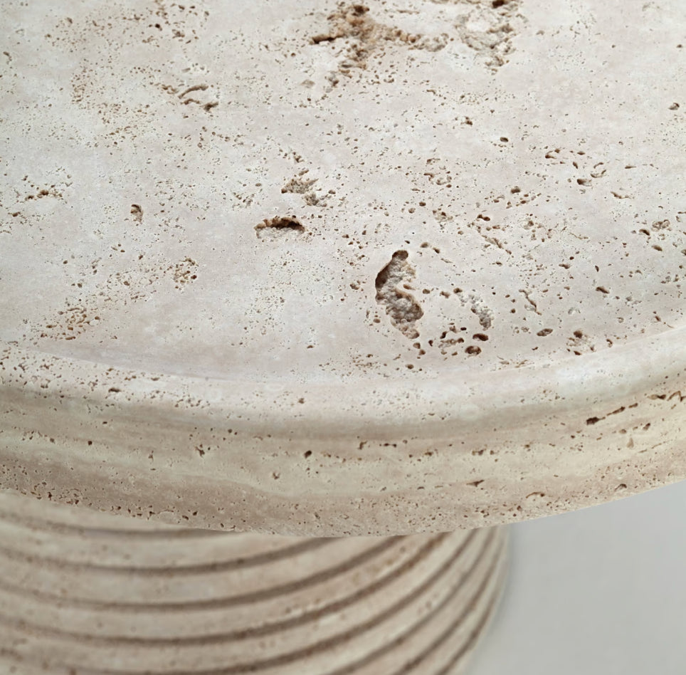 Poppy Dining Table - Marble, close-up of the ribbed Travertine top edge and base
