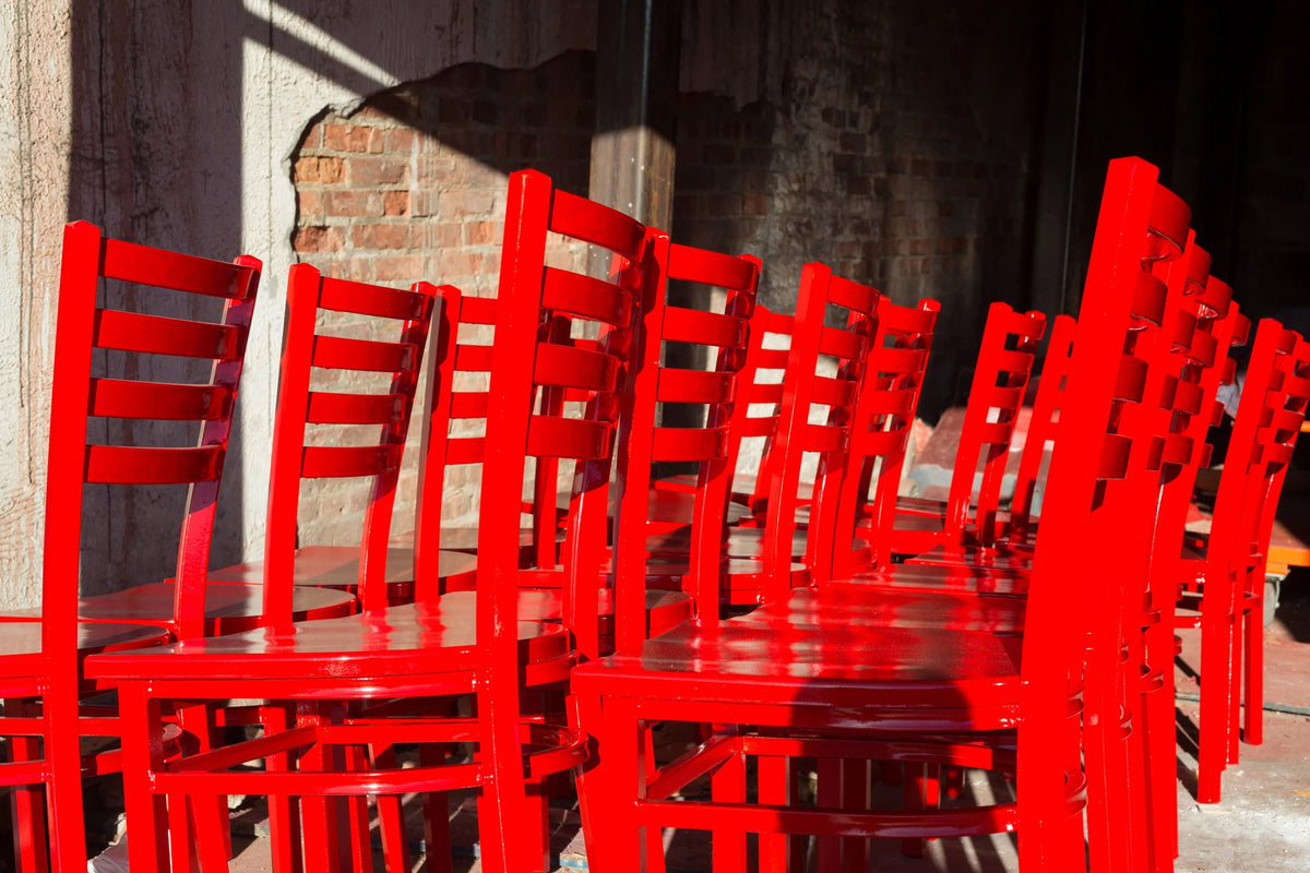 Red Chairs by Maison Burgos