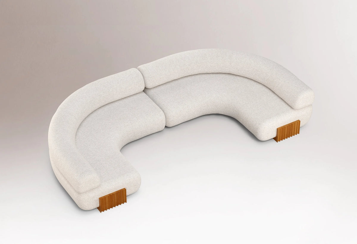 Carmel Curved Modular Sofa - 2 Piece in cream bouclé, three-quarter view
