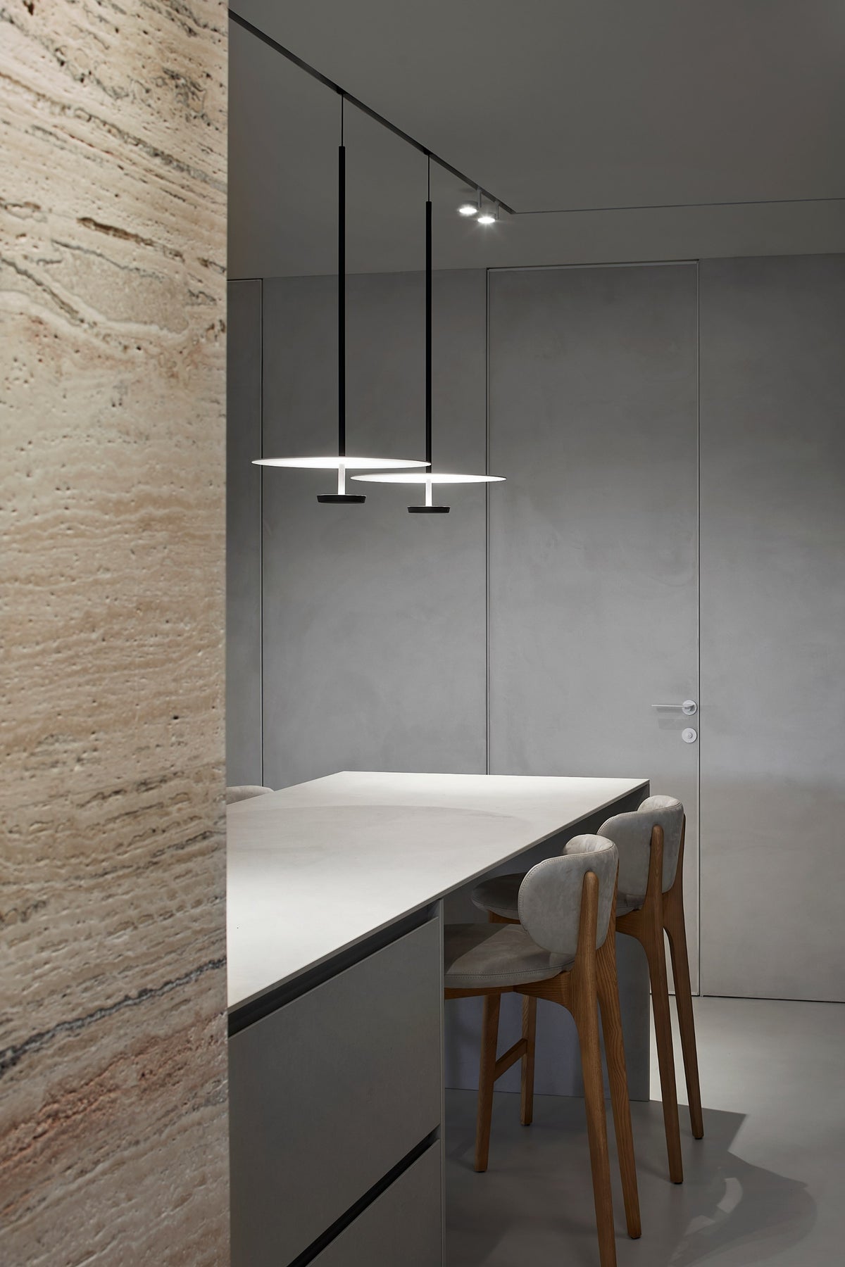Richmond Bar Stools at a dark counter under black pendant lights