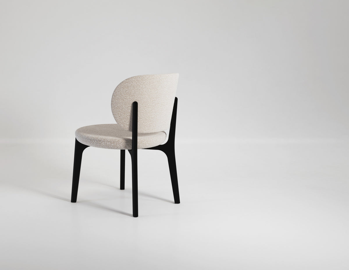 Richmond Lounge Chair in cream, three-quarter view on a grey backdrop