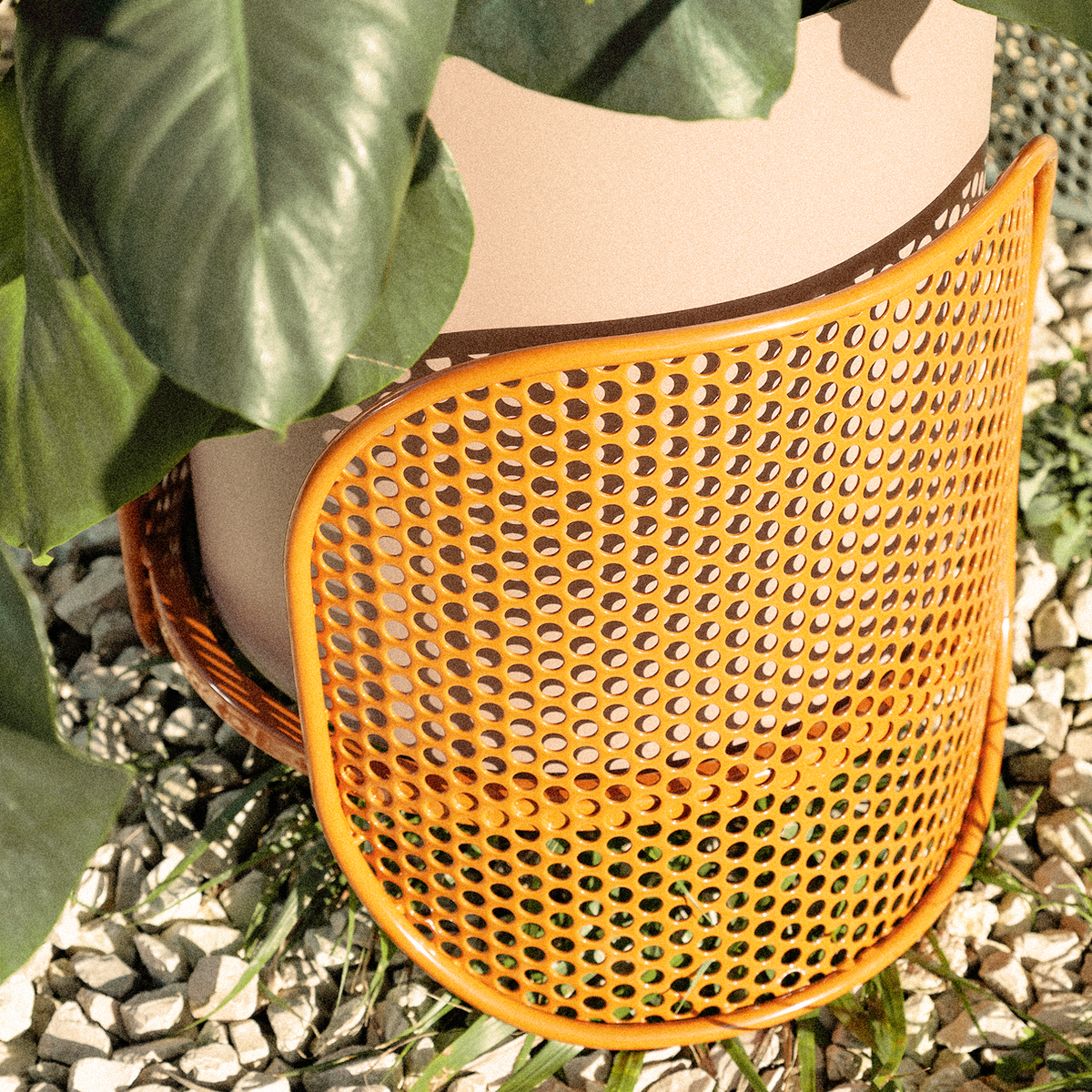 Riviera Vases close-up of the copper perforated metal foot
