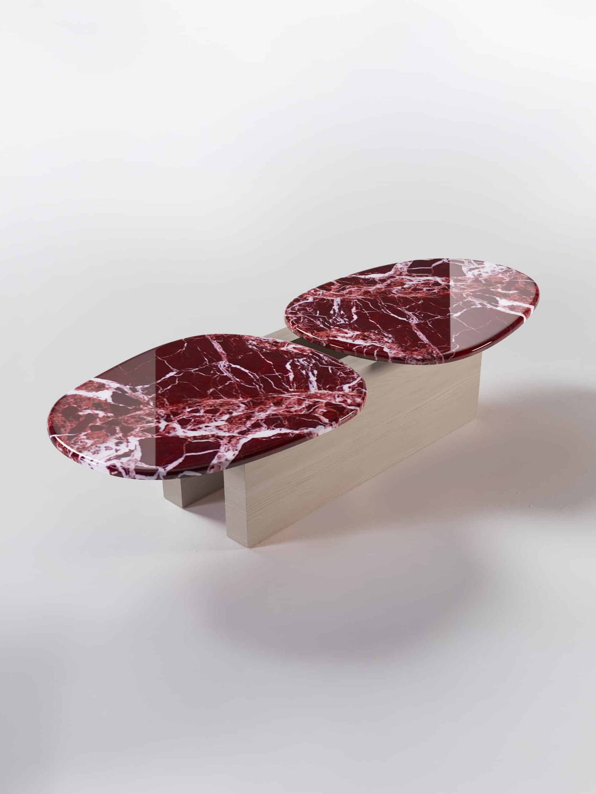 Taras Coffee Table with red marble tops on light oak, three-quarter view on white