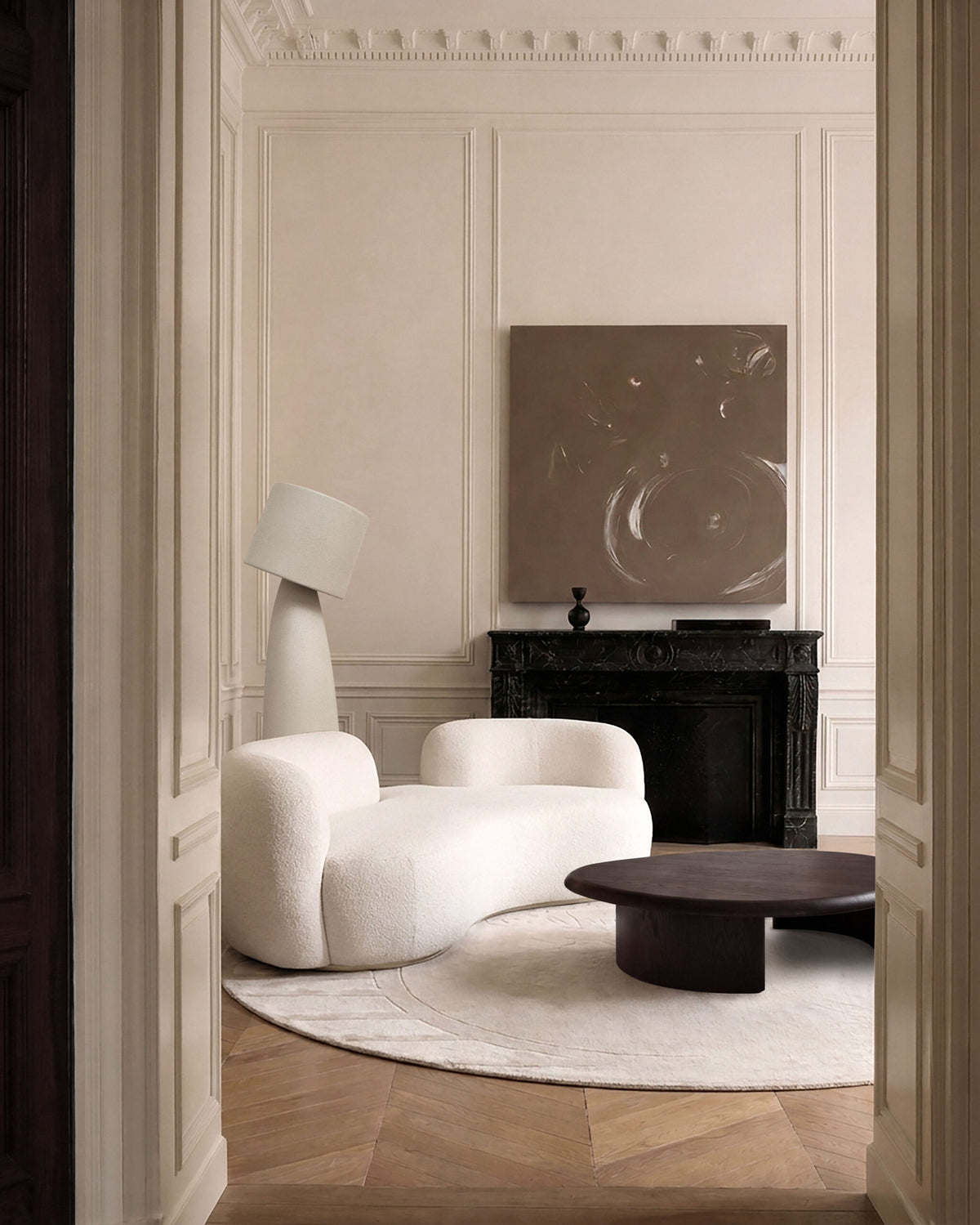 Tateyama Cloud Sofa in a Parisian living room with round dark coffee table