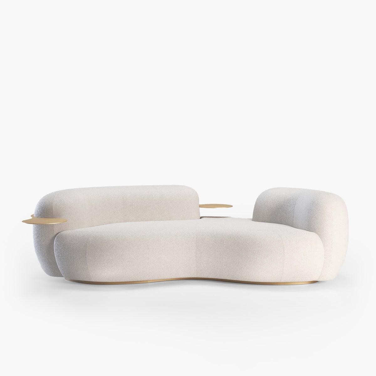 Tateyama Curved Sofa in white boucle, three-quarter view with brass side tray