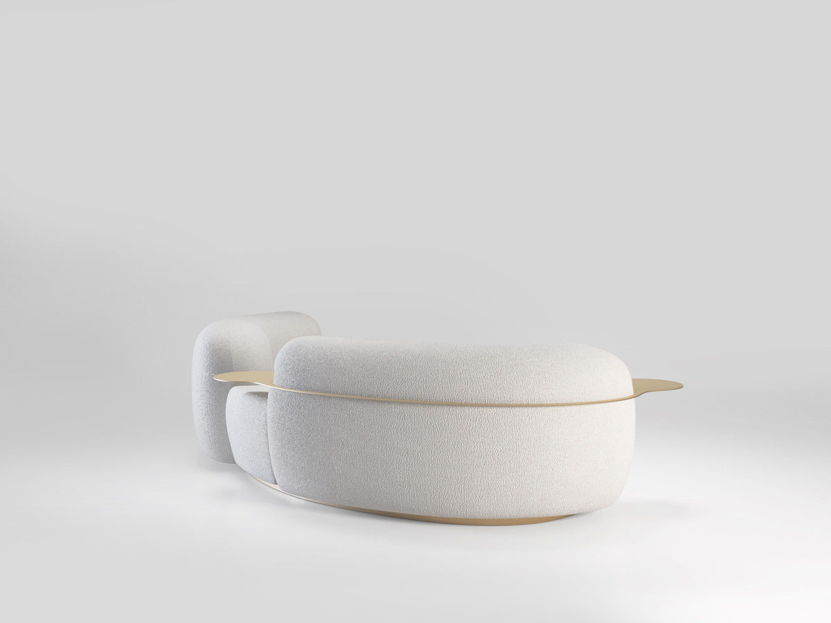 Tateyama Curved Sofa in white boucle, side view showing the rounded back and tray