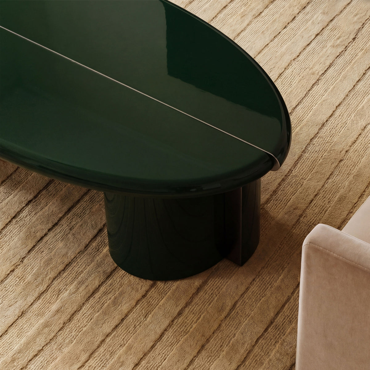 Tayma Coffee Table in Bottle Green, overhead detail on a striped rug