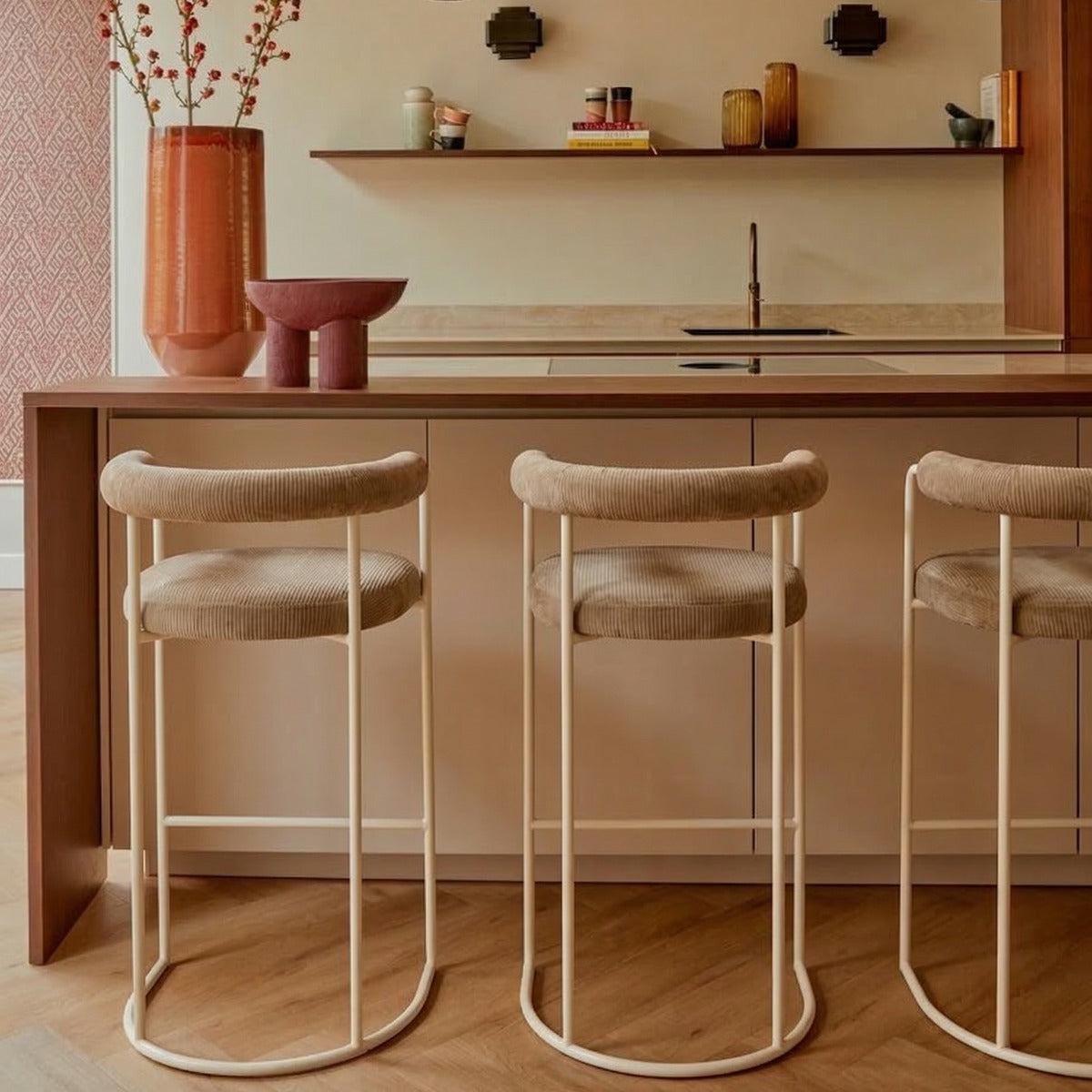 Volta Counter Stools in Orion III Sand at a kitchen island by Maison Burgos
