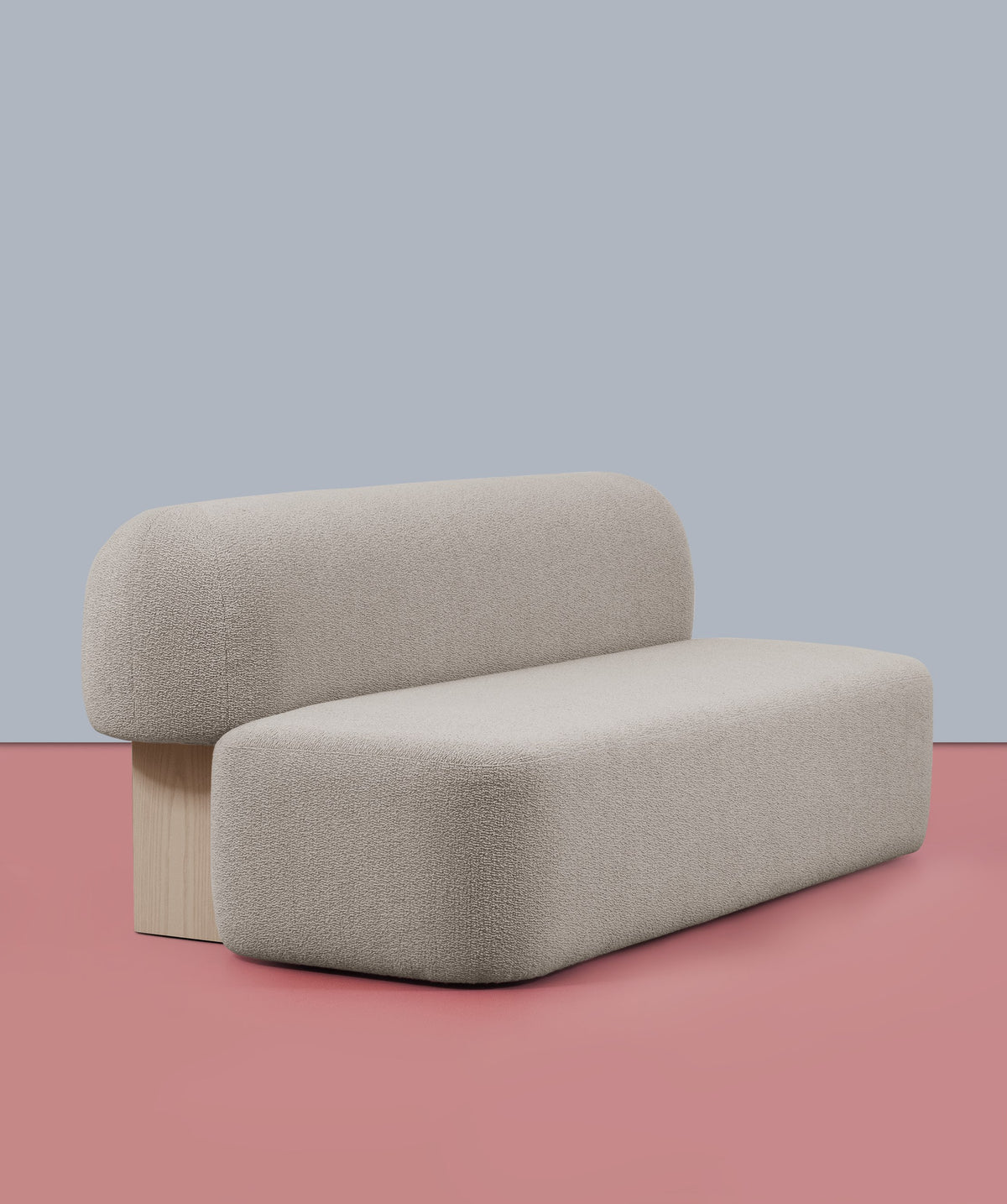 Yemeni Sofa in cream Soft Bouclé on a blush backdrop, three-quarter view