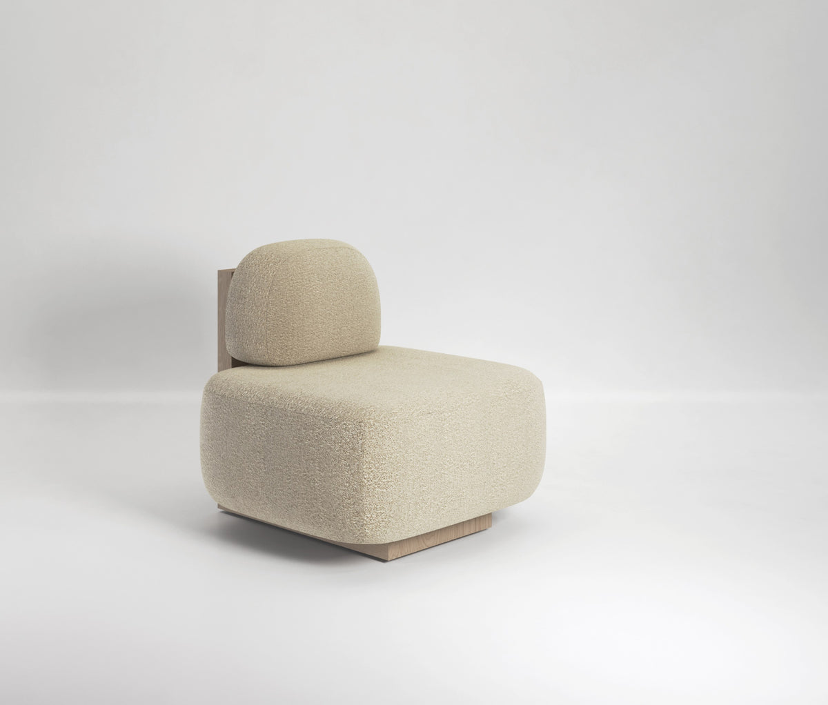 Yoshida Lounge Chair in cream boucle on a white backdrop, side three-quarter view