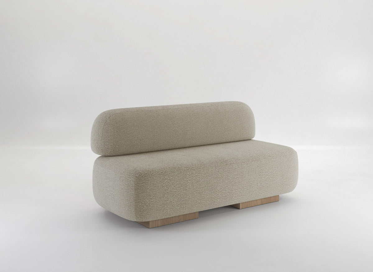 Yoshida Sofa in beige bouclé, front view on a grey backdrop