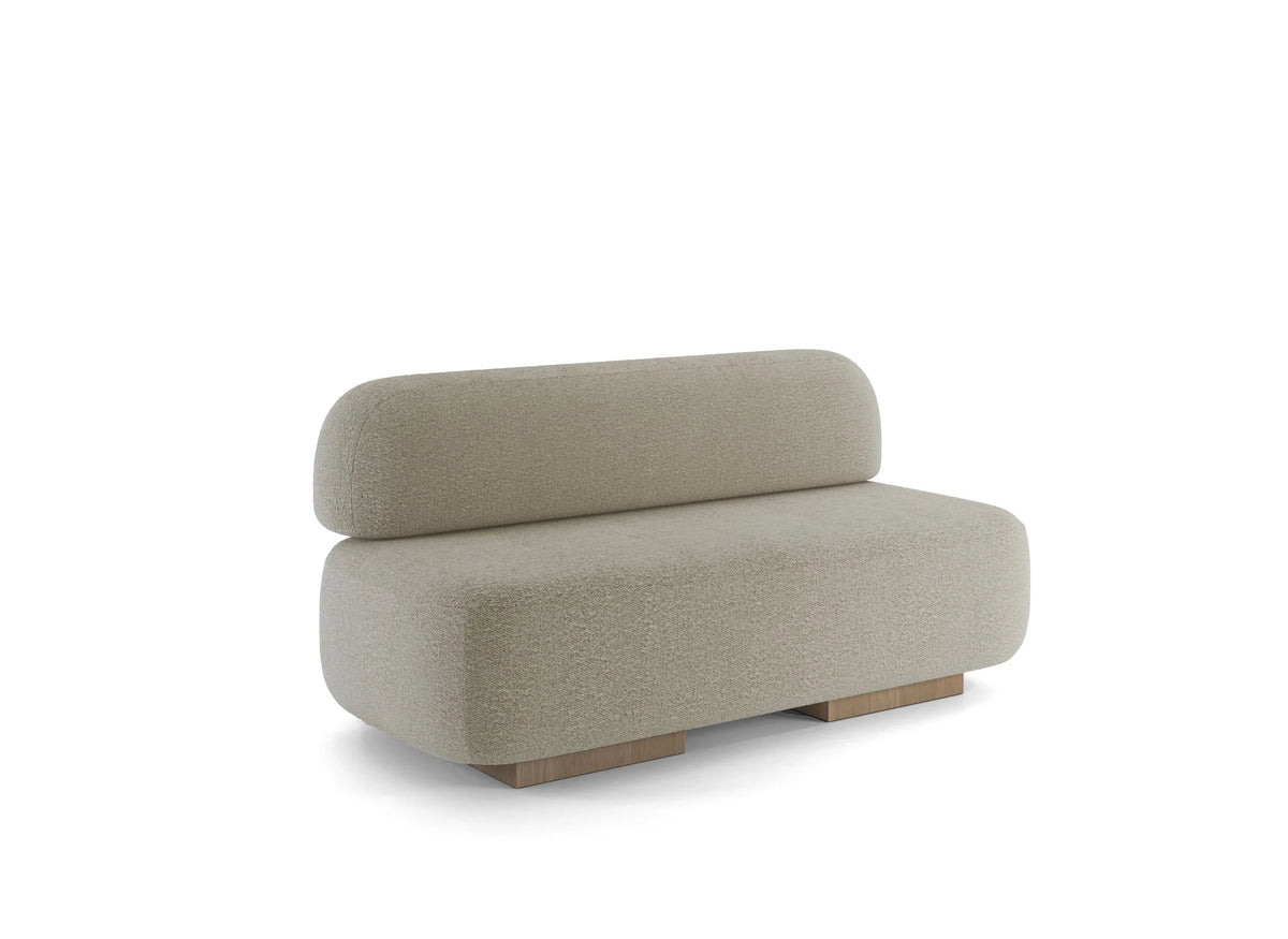 Yoshida Sofa in beige bouclé on low oak plinths, front three-quarter