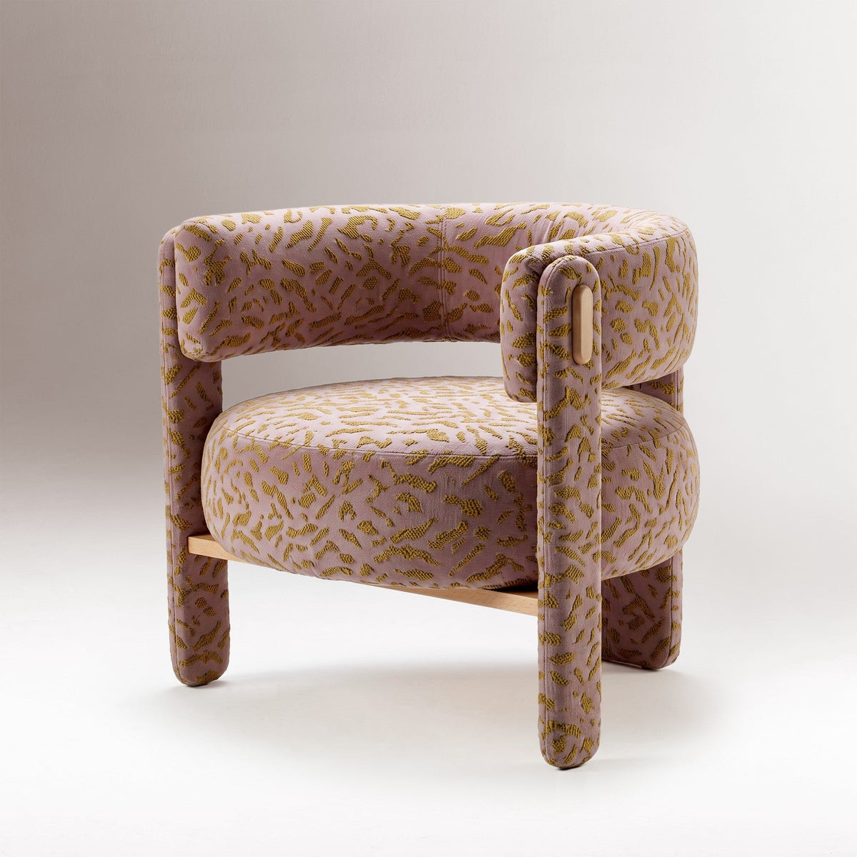 Choux armchair in patterned fabric with a round seat