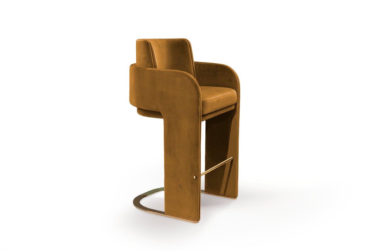 Odisseia Counter Stool in amber velvet on a white background