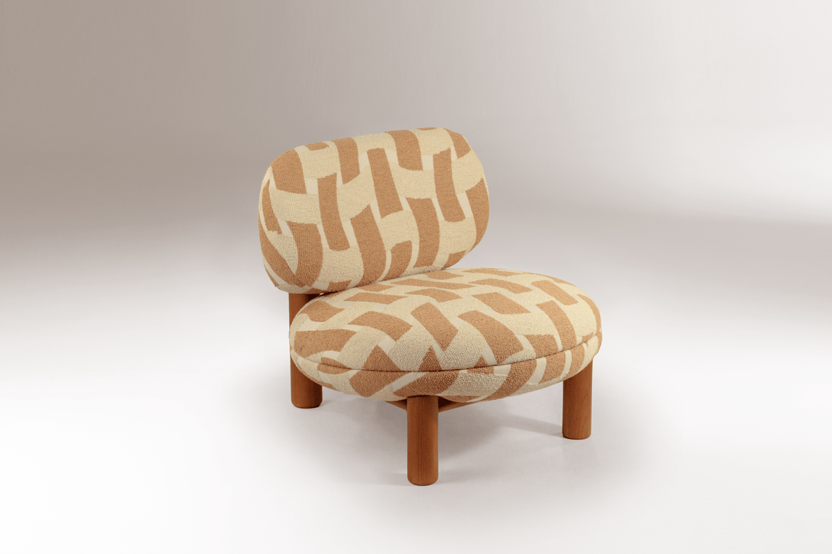 Aimi Lounge Chair in cream and terracotta patterned fabric with walnut-tone legs, front view