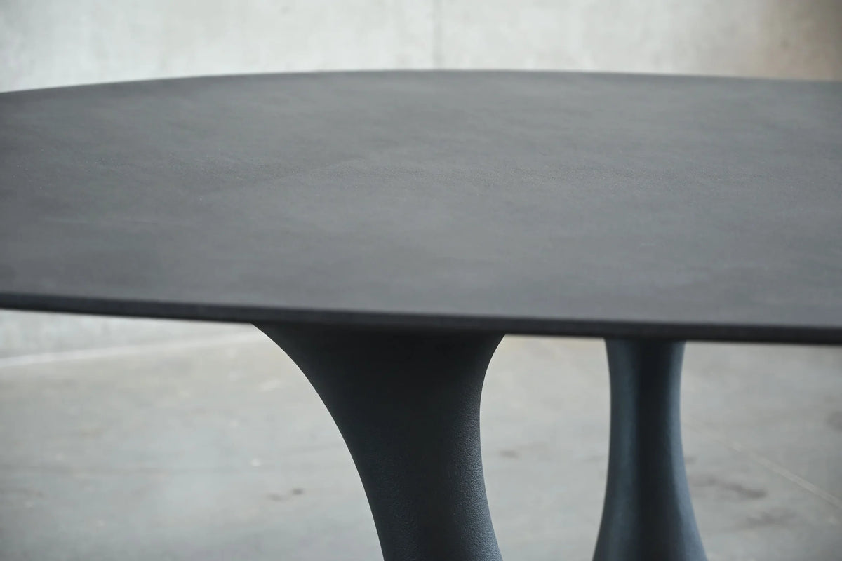 Groot Dining Table close-up of the top and sculptural legs