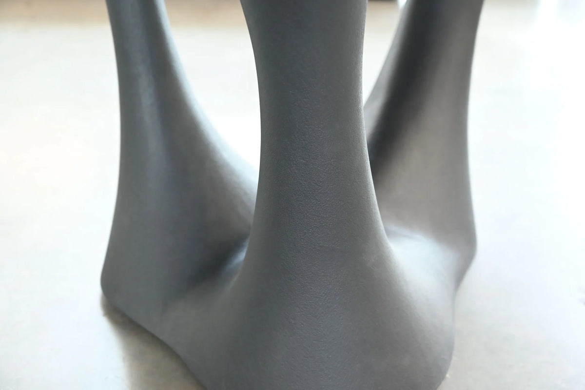 Groot Dining Table close-up of the sculptural base
