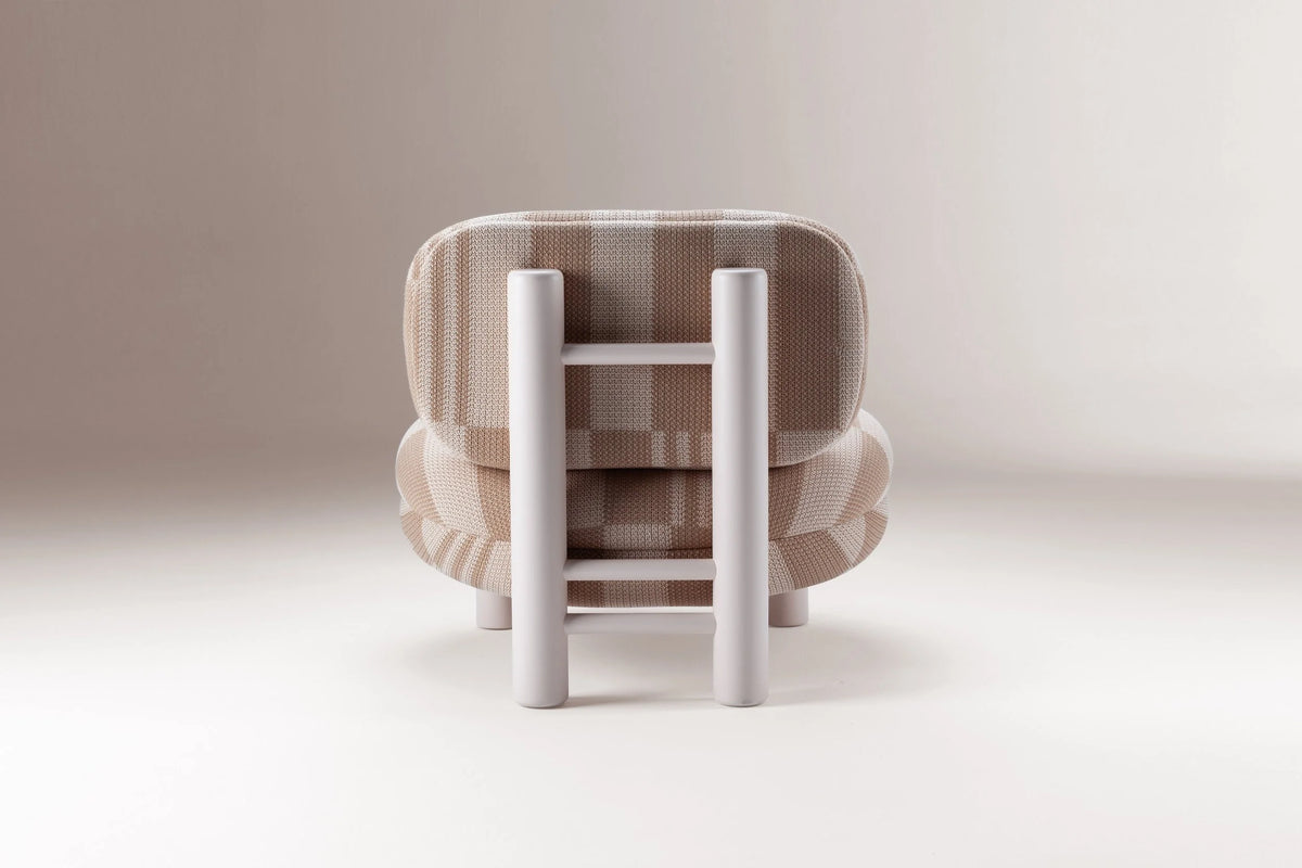 Aimi Lounge Chair in pink striped fabric, back view of the ladder-style frame