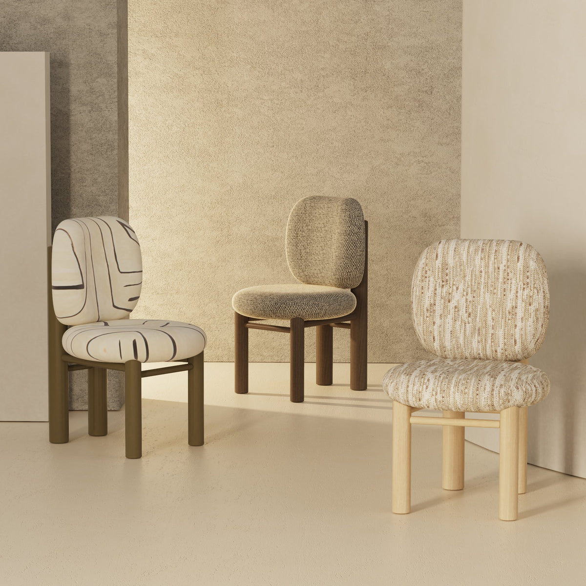 Aimi Chair trio in brushstroke, bouclé and textured fabrics in a beige studio