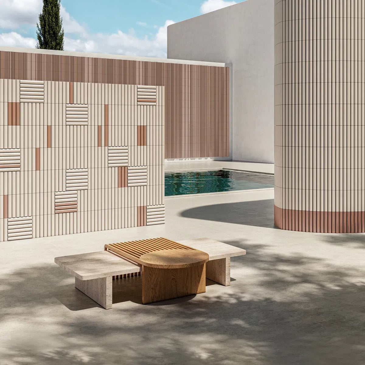 Stick and Stone Coffee Table outdoors beside a pool and striped tile wall