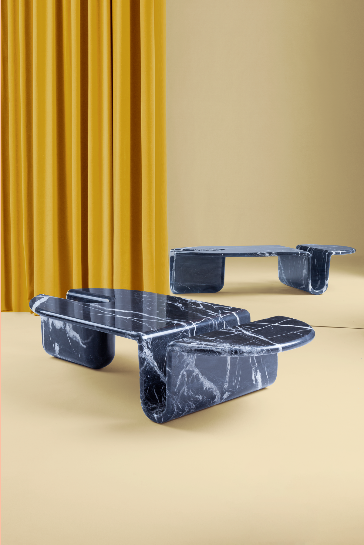 Bonnie & Clyde Coffee Table pair in Nero Marquina on a yellow set