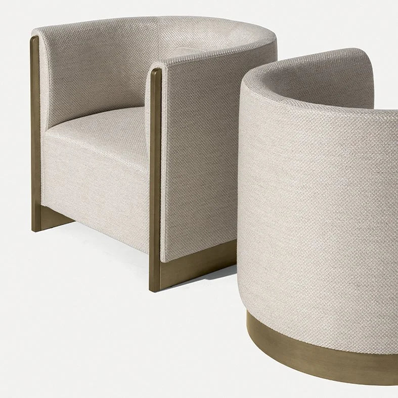 Adeline Armchair pair in ivory weave showing bronze frame and base