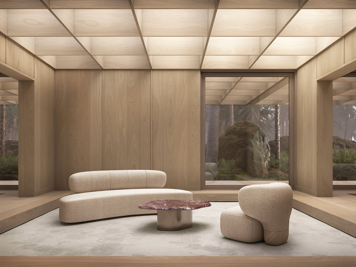 Asawa Lounge Chair in a wood-panelled pavilion with a curved sofa and red marble table