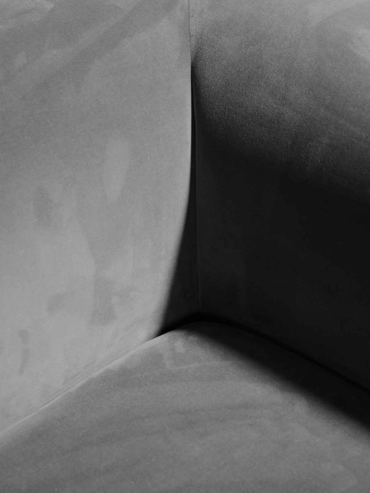 Archi Sofa close-up of soft grey velvet seat corner